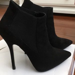 Gently used black booties!